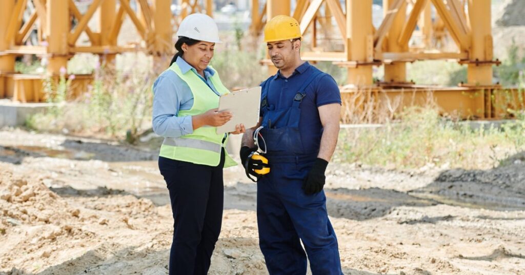 Contractor reviewing a certificate of insurance on a job site
