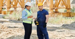 Contractor reviewing a certificate of insurance on a job site